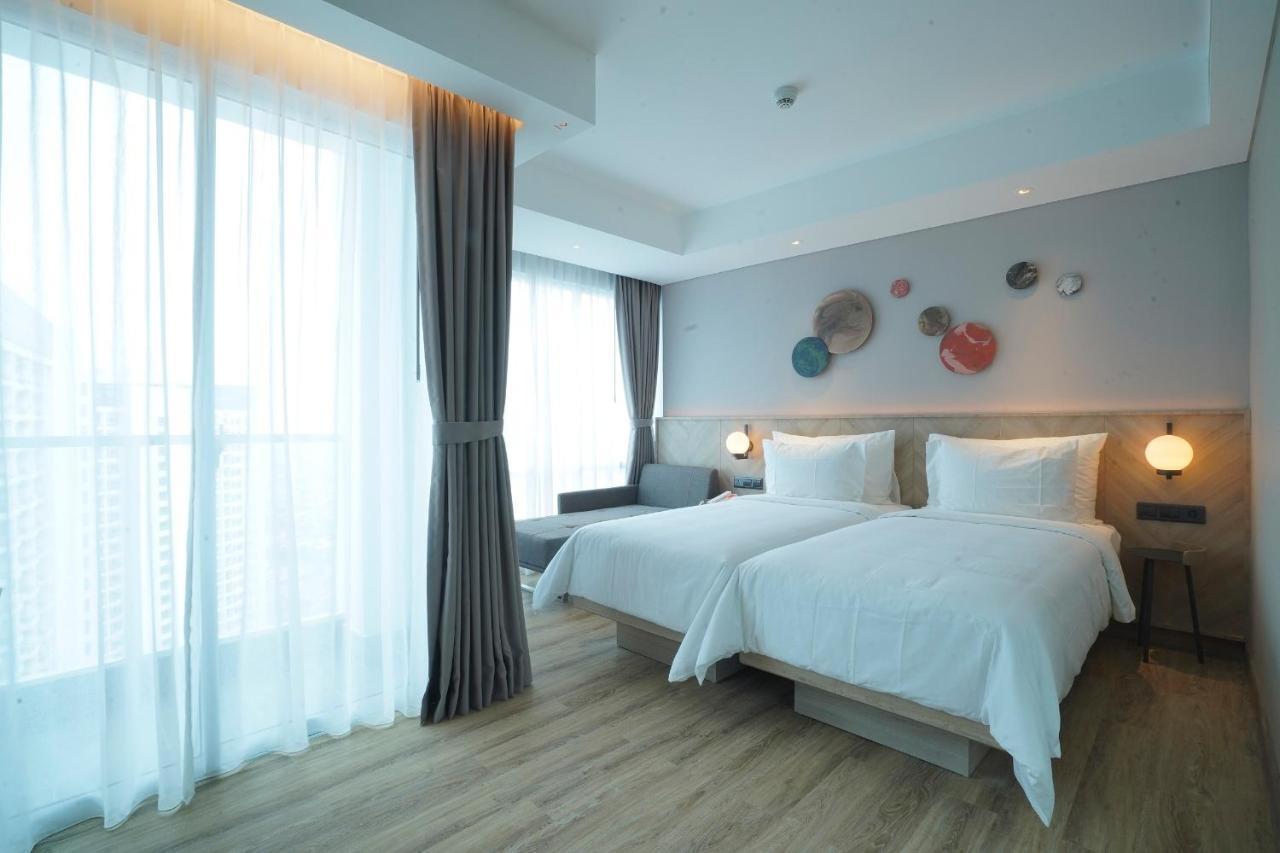Harris Suites Puri Mansion Jakarta Exterior foto